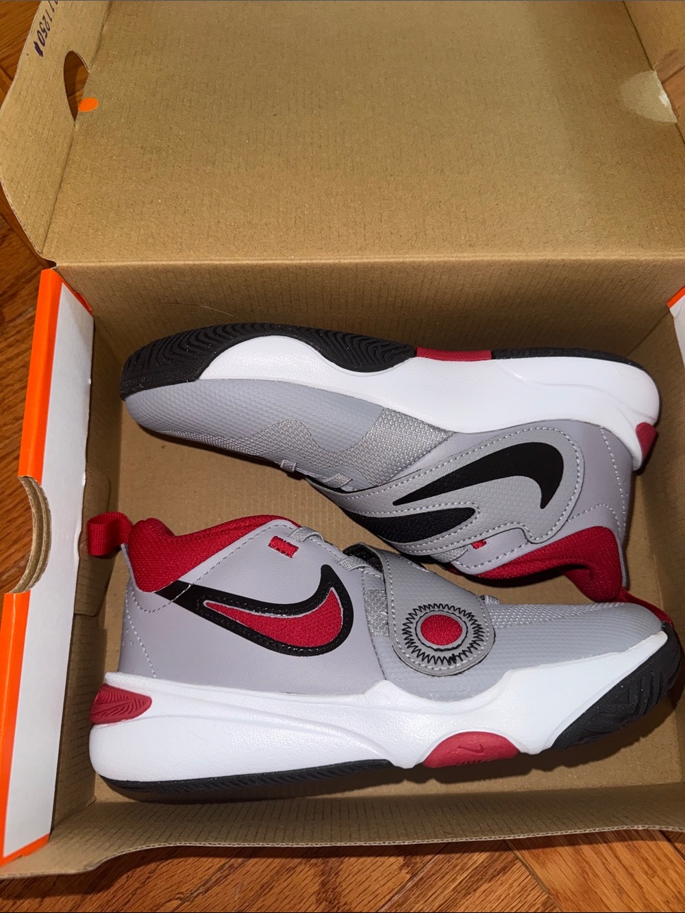 Nike Kids Cement Grey and Red Athletic Sneakers with Black Swoosh